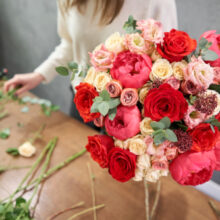 European,floral,shop,concept.,florist,woman,creates,red,beautiful,bouquet